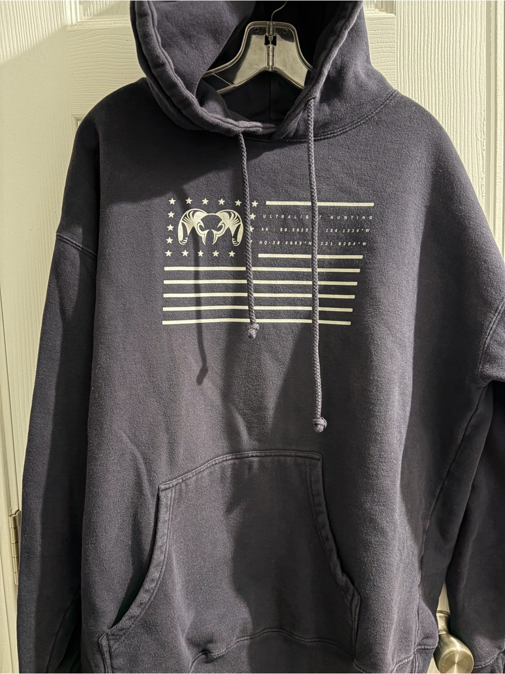 KUIU Navy Pullover Hoodie with Cream Ram Flag Graphic